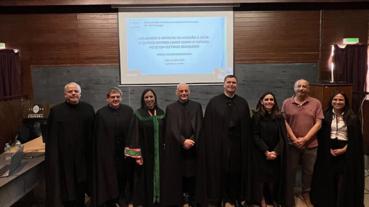 Dr Alex Feil with members of the PhD jury